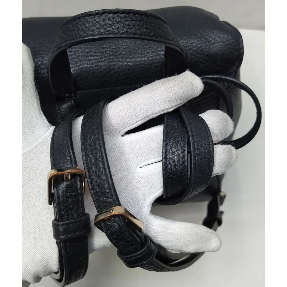 Kate Spade New York Black Pebbled Leather Zipper Flap Drawstring Backpack